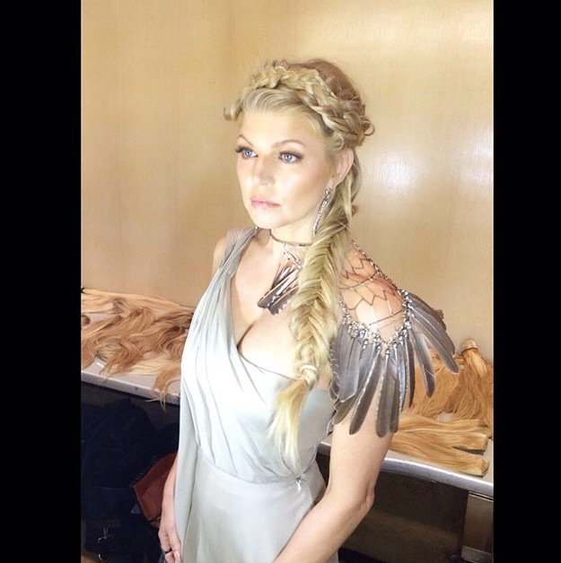 Fergie: Behind the scenes wearing woodpecker feather necklace as shoulder piece
