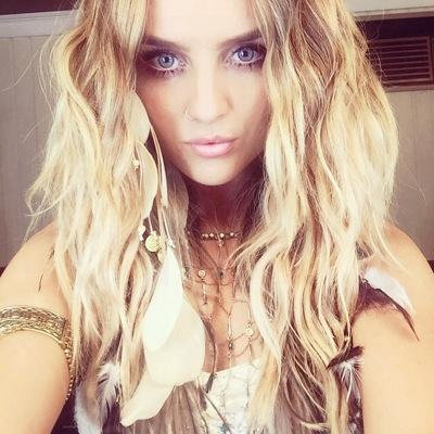 Perrie Edwards: Emu feather necklace for "Black Magic" music video